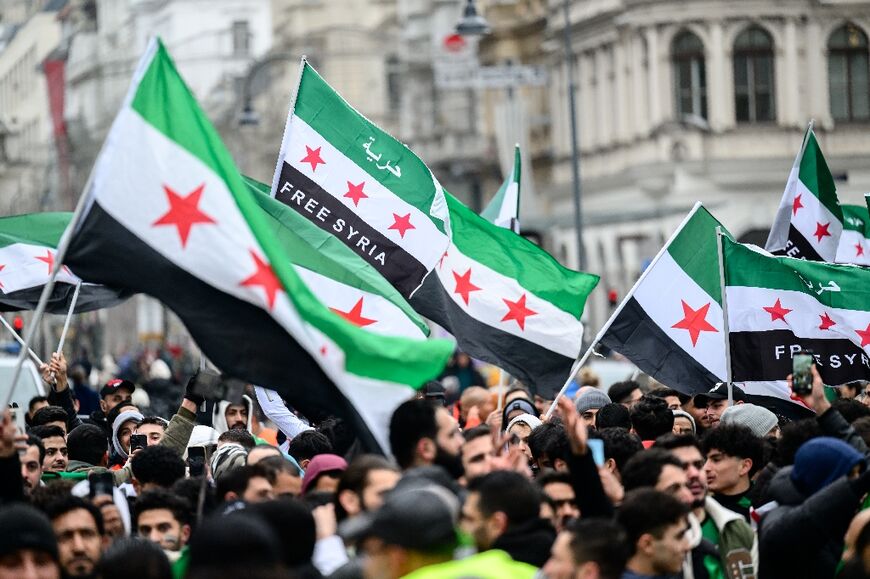 The people of Syria celebrate the downfall of Bashir al-Assad as the brutual dictatorship and the end of the Assad family dynasty